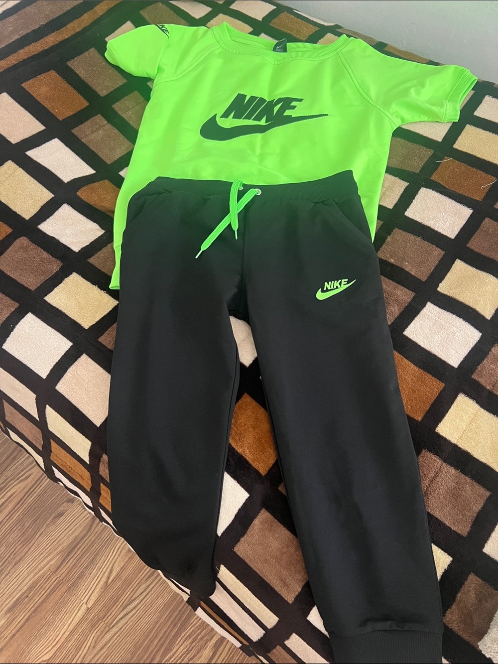 Nike Kids Black Jogger Pants with Neon Green Logo